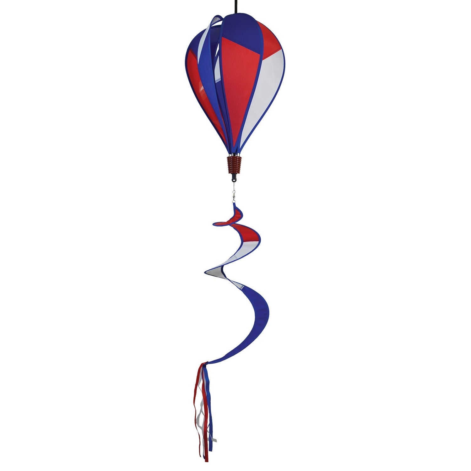 Vibrant Patriot Hot Air Balloon spinner in red, white, and blue colors gently spinning in an outdoor garden setting, showcasing its applique design.