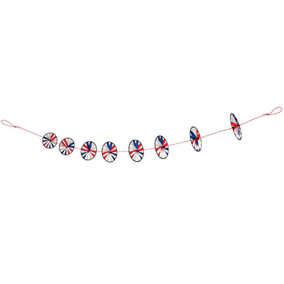 Patriot Spinner Wheels on String with red, white, and blue spinning wheels, hanging decor fluttering in the breeze in a garden setting.