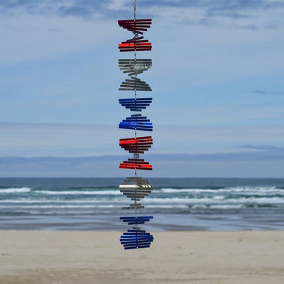 The Patriot Stacked Shimmer Helix Spinner showcases a stunning design in red, white, and blue, perfect for adding a festive touch to outdoor settings.