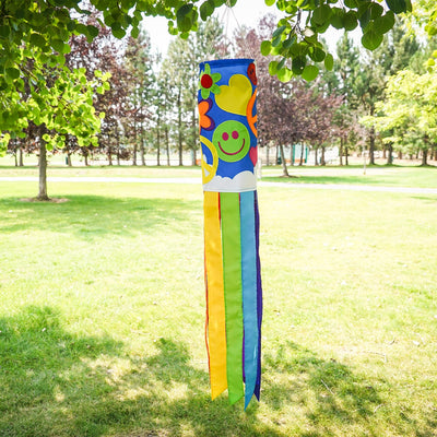 Peace, Love & Happiness 40-inch windsock with psychedelic designs and colorful tails, fluttering in the breeze outdoors.