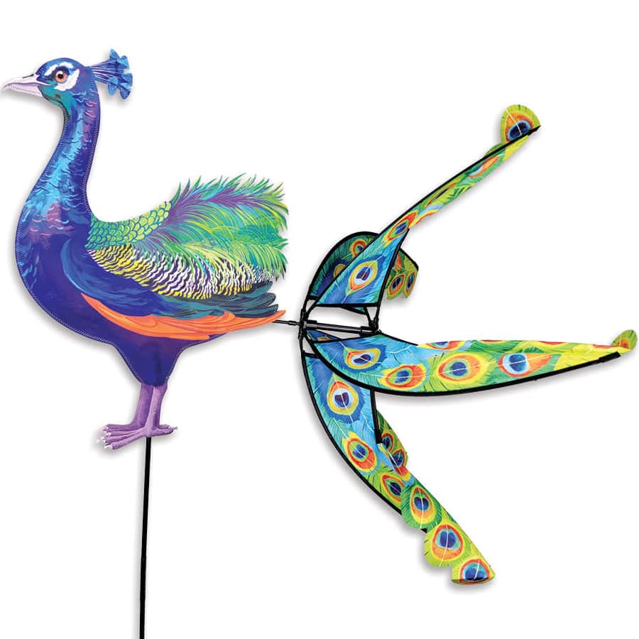 Outdoor kinetic spinner featuring a vivid peacock with spinning tail feathers, designed for weather resistance and bold, continuous movement.