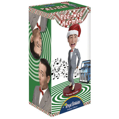 Pee-Wee Herman Holiday Bobblehead featuring the character in a gray suit and red bowtie, standing approximately 7 inches tall on a display surface.