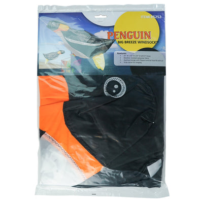 Penguin Big Breeze WindsockTM displayed outdoors showcasing its vibrant colors and 3D body, filled with air as it sways in the breeze.