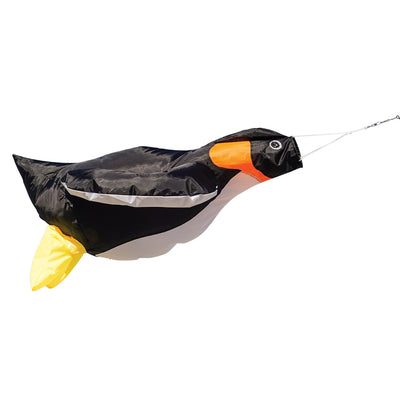 Penguin Big Breeze WindsockTM displayed outdoors showcasing its vibrant colors and 3D body, filled with air as it sways in the breeze.