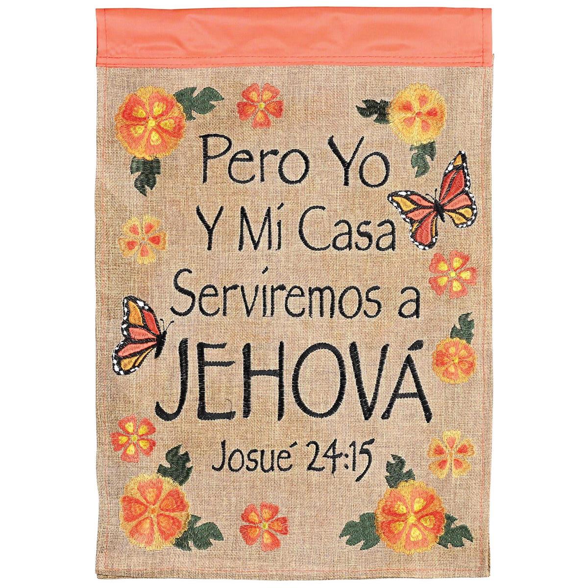Pero Yo Y Mi Case Serviremos double-sided garden flag with intricate fabric appliques and embroidery displayed on a decorative flagpole in a garden.