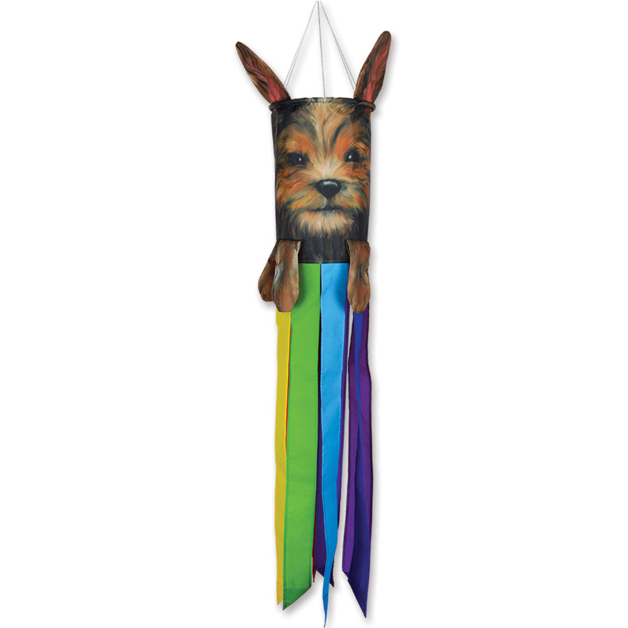 Pet Windsock - Yorkie featuring a playful dog face with separately applied ears and tail, swaying in a gentle breeze outdoors.