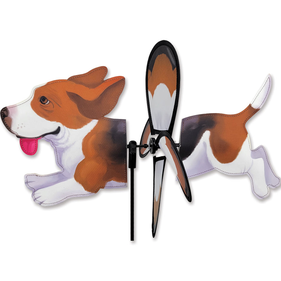 Petite Spinner - Basset Hound with vibrant wings rotating in the wind, displayed in a colorful garden setting.