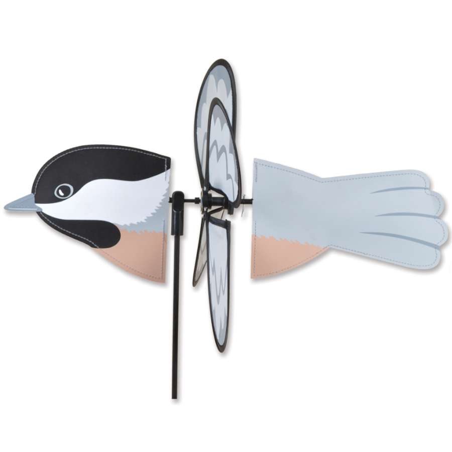 Petite Spinner - Chickadee featuring adorable chickadee design, brightly colored and spinning gently in an outdoor garden setting.