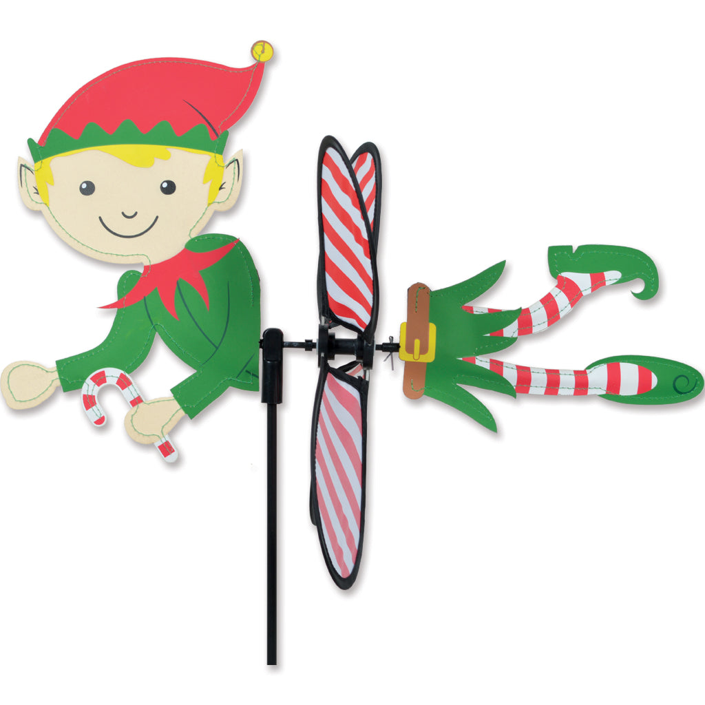 Petite Spinner - Christmas Elf twirls in the garden, showcasing vibrant colors and festive design, perfect for holiday decoration.