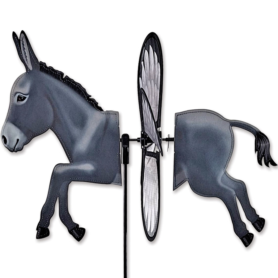 Petite Spinner - Donkey garden ornament displaying vibrant colors and whimsical design, spinning gracefully in a gentle breeze outdoors.