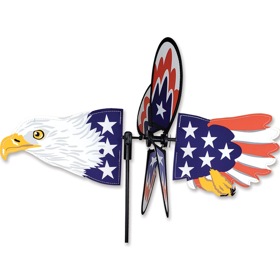 Petite Spinner - Flying Patriotic Eagle spinning in a garden, showcasing vibrant colors and detailed craftsmanship of an eagle.
