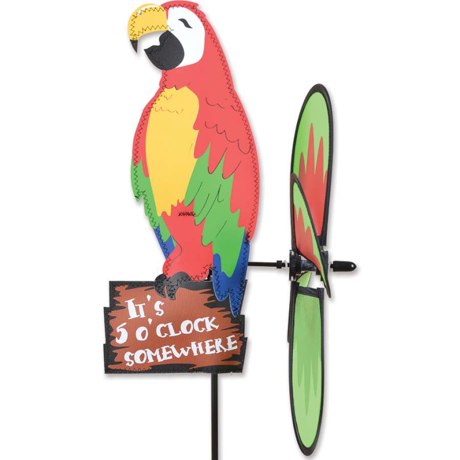 Petite Spinner featuring a colorful Party Macaw design, spinning gently in a vibrant garden setting, complementing the outdoor decor.