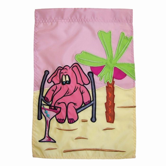 Colorful Pink Elephant Garden Flag with applique and embroidered details displayed in a sunny outdoor garden setting.