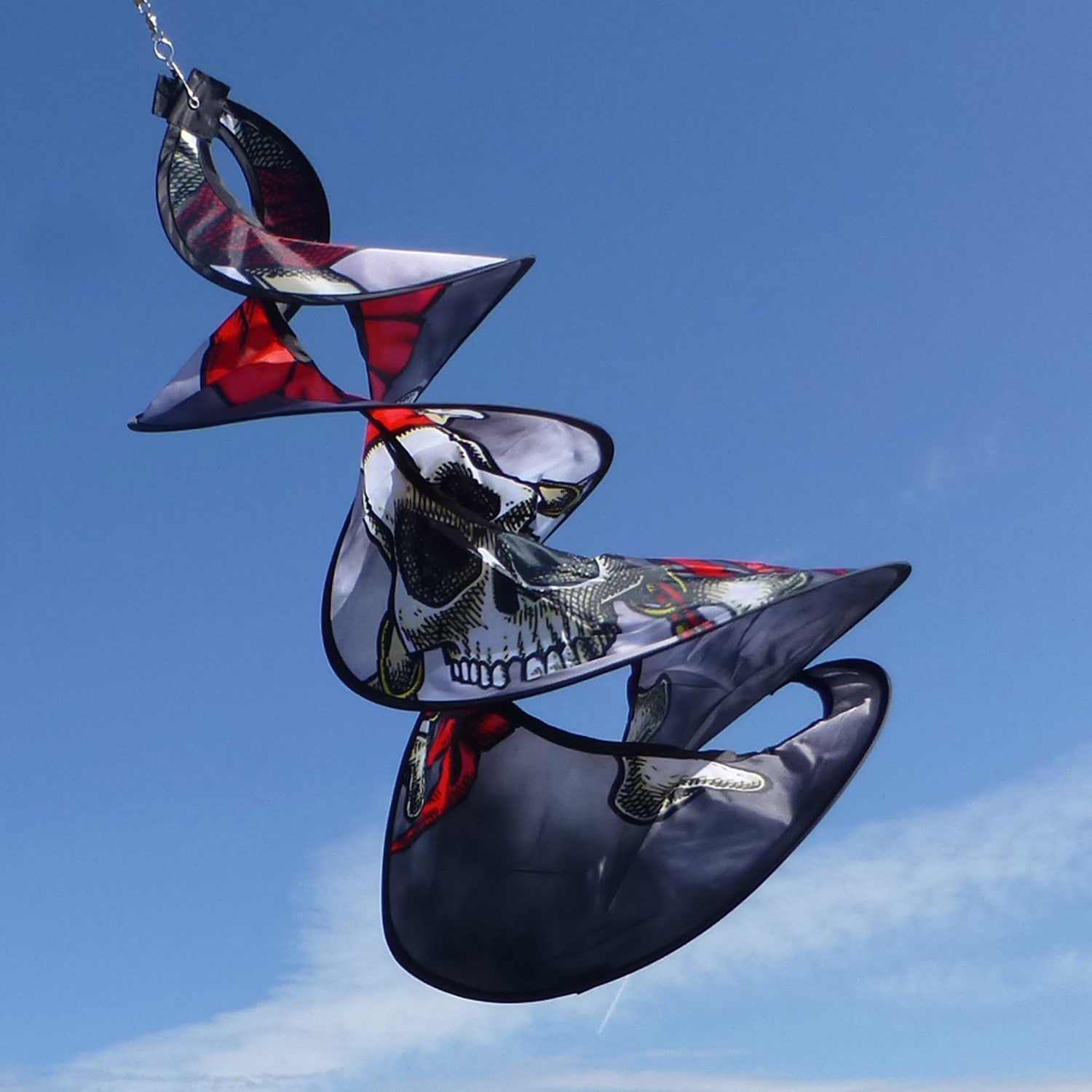 Pirate Spin Duet displaying colorful graphics of pirates spinning gracefully in an outdoor garden setting, showcasing its unique design.