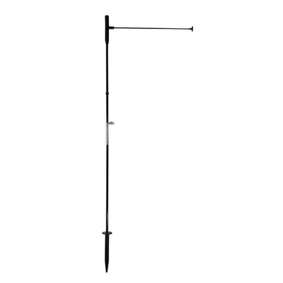 Pivoting garden flag pole with 2-section fiberglass construction, holding a garden flag, set against a vibrant outdoor backdrop.