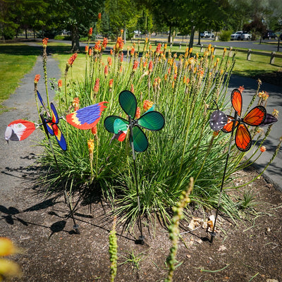 Pivoting Hummingbird Spinner featuring a colorful 15-inch petal wheel, showcasing hummingbirds, spins and pivots in the garden.