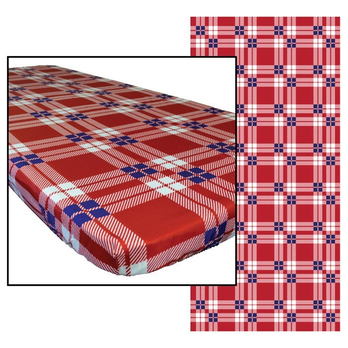 Plaid 6' Tablecloth spread over a picnic table in a sunny outdoor setting, secured with deep pockets, enhancing the cheerful atmosphere.