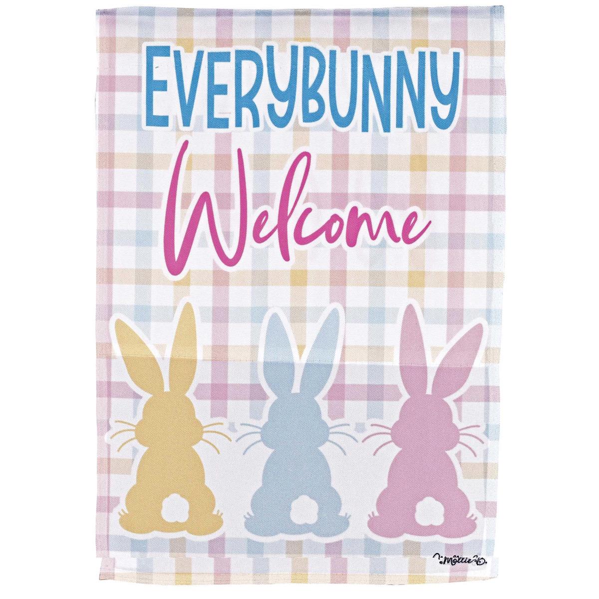 Plaid Easter Bunnies Garden Flag, measuring 13x18 inches, featuring playful bunny designs on durable fabric, displayed in a garden setting.