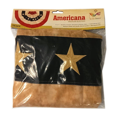 Pleated Fan Americana Bunting 2' x 4' featuring embroidered stars on a tea-stained background, hung decoratively in an outdoor setting.