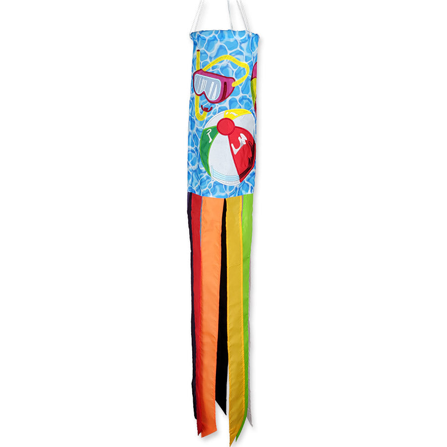 Colorful Pool Time windsock with embroidered beach toys, flip flops, and a popsicle, fluttering in the breeze from an outdoor hook.