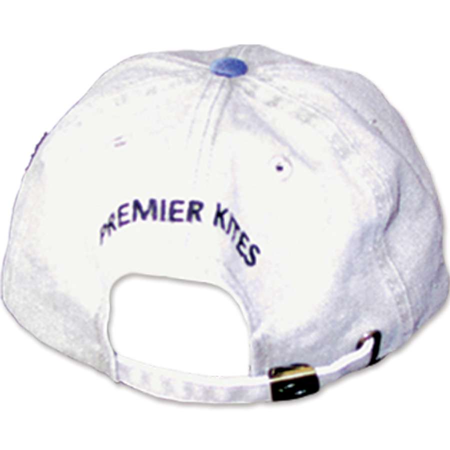 Premier Baseball Cap featuring a prominent logo, designed for outdoor use, displayed on a picnic table under bright sunlight.