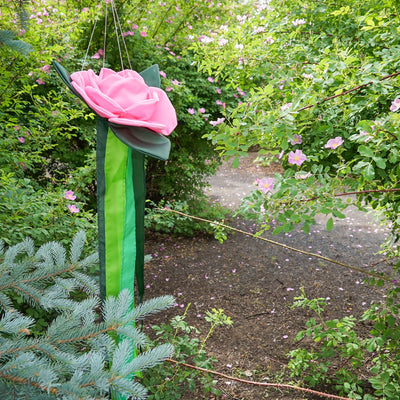Pretty as a Rose Floral Windtail featuring 3D rose blossoms and color-coordinated tails hanging gracefully in an outdoor setting.