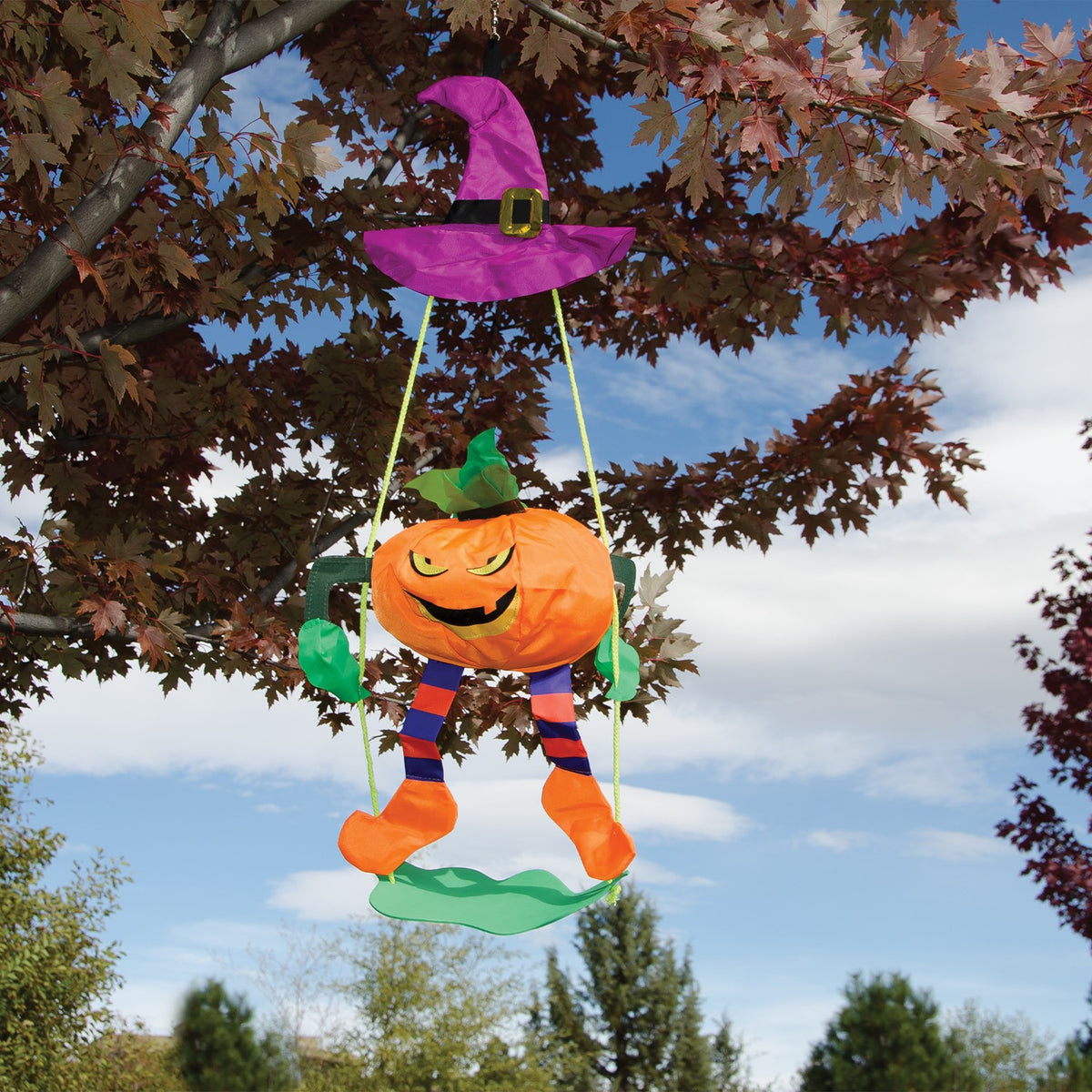 Pumpkin Swingerz 3D garden decoration with a smiling jack-o-lantern swinging beneath a witch's hat, showcasing its fun detailed design.