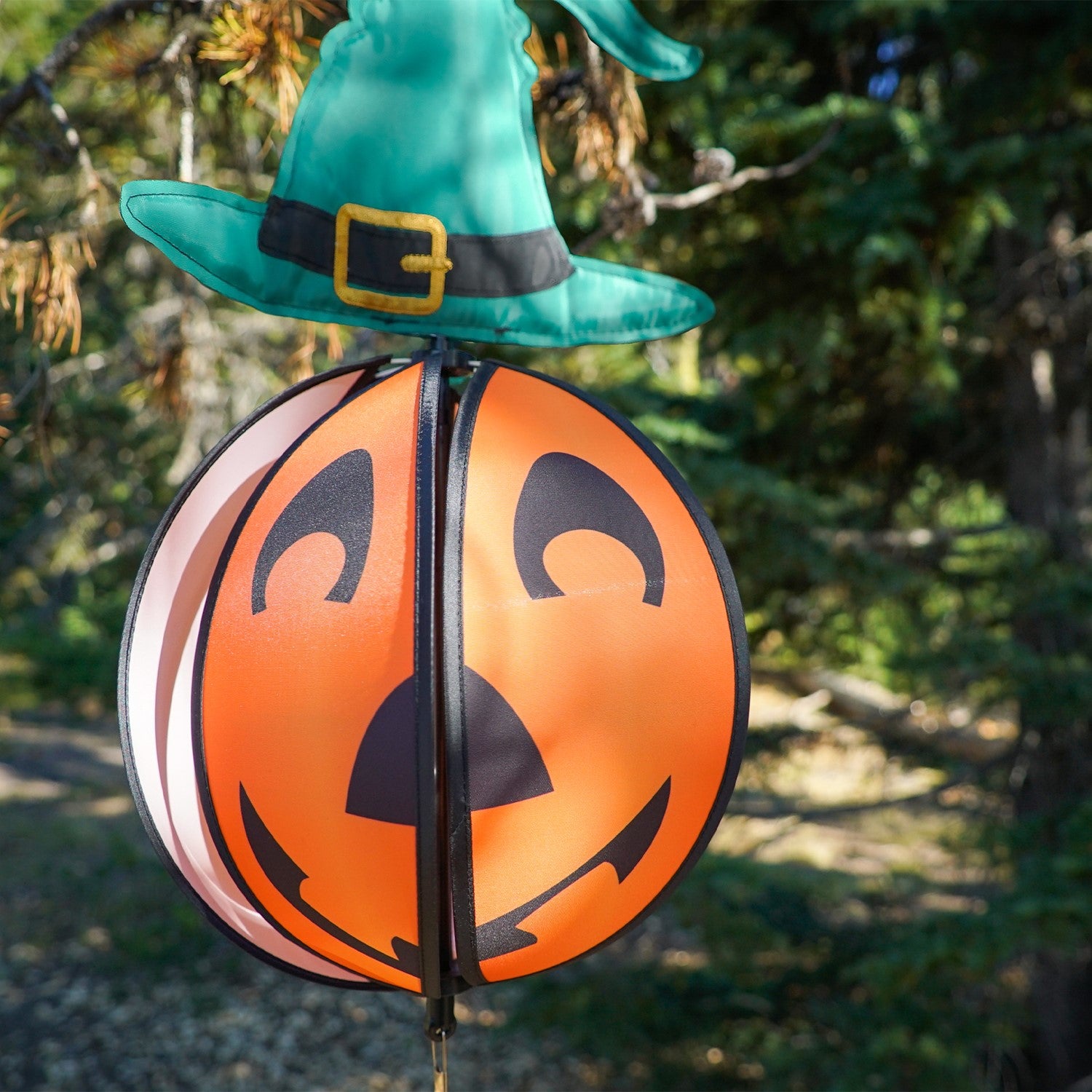 Pumpkin with Hat Hanging Ball Spinner featuring a friendly pumpkin face and colorful hat, spinning in a garden setting during autumn.
