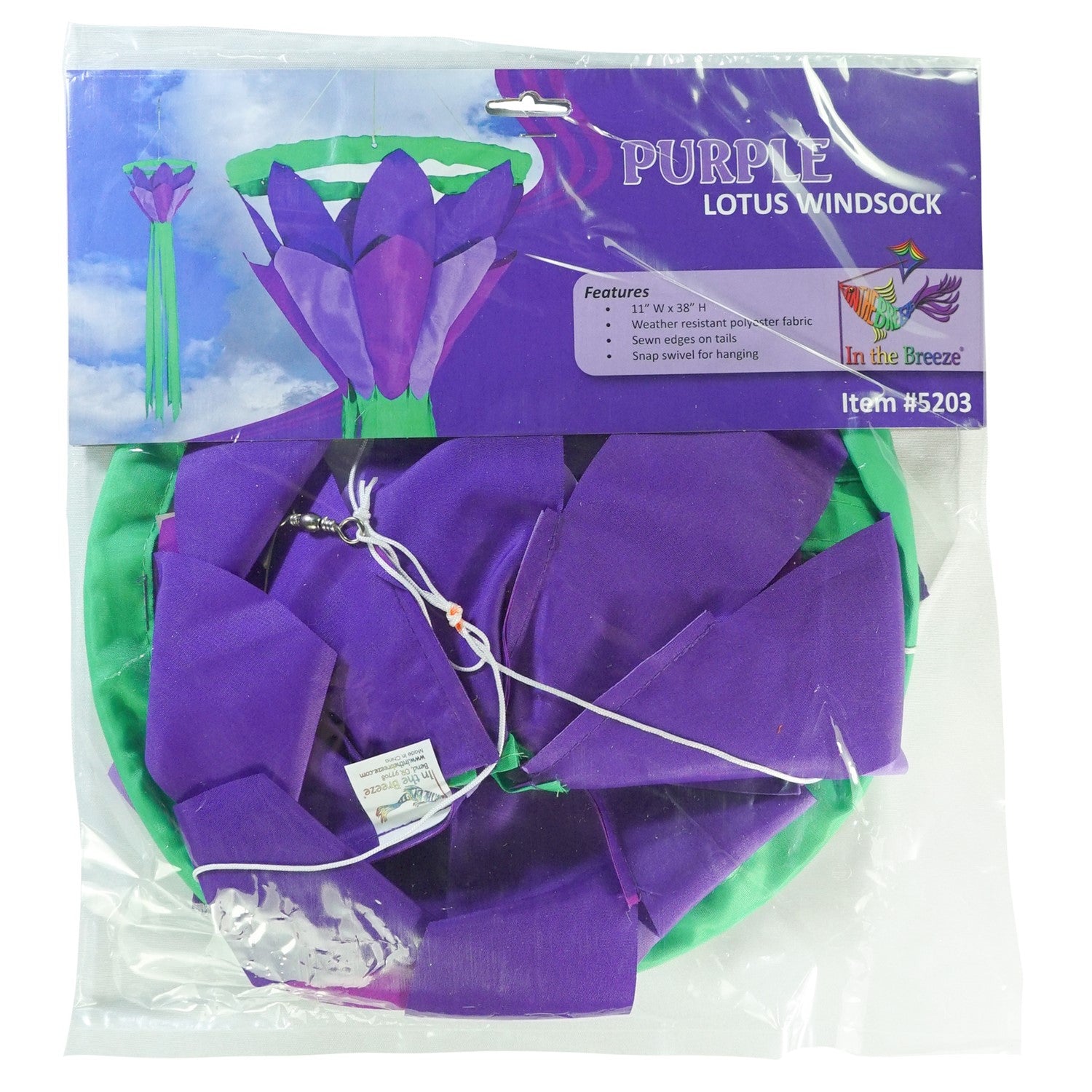 Purple 38 inch lotus flower windsock with bright petals and flowing green tails, elegantly displayed in a garden setting, showcasing its colorful design.