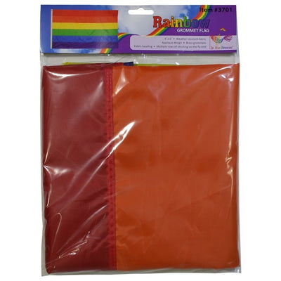 Vibrant Rainbow 4x6 Grommet Flag with bold colors, attached to a flagpole flying against a clear sky, celebrating LGBTQ+ pride and inclusivity.