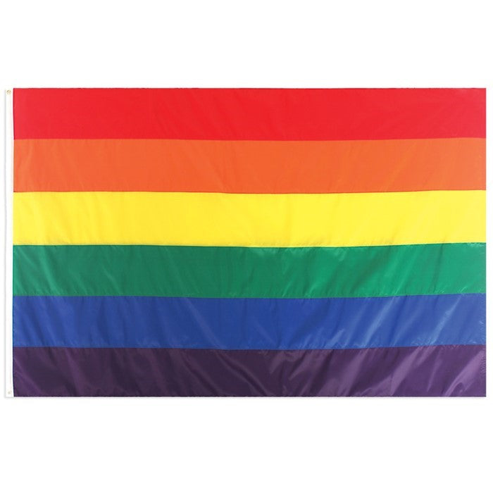 Rainbow 5x8 grommet flag with vibrant colors, secured with brass grommets, fluttering proudly in an outdoor setting, perfect for celebrations.