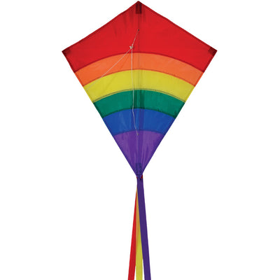 Rainbow Arch 27-Inch Diamond Kite displaying colorful arcs in the sky, ready for flying on a bright day outdoors.