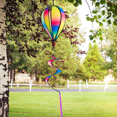 Rainbow Blended Hot Air Balloon with blended colorful panels, twister tail, and clear plastic accents displayed in an outdoor setting.