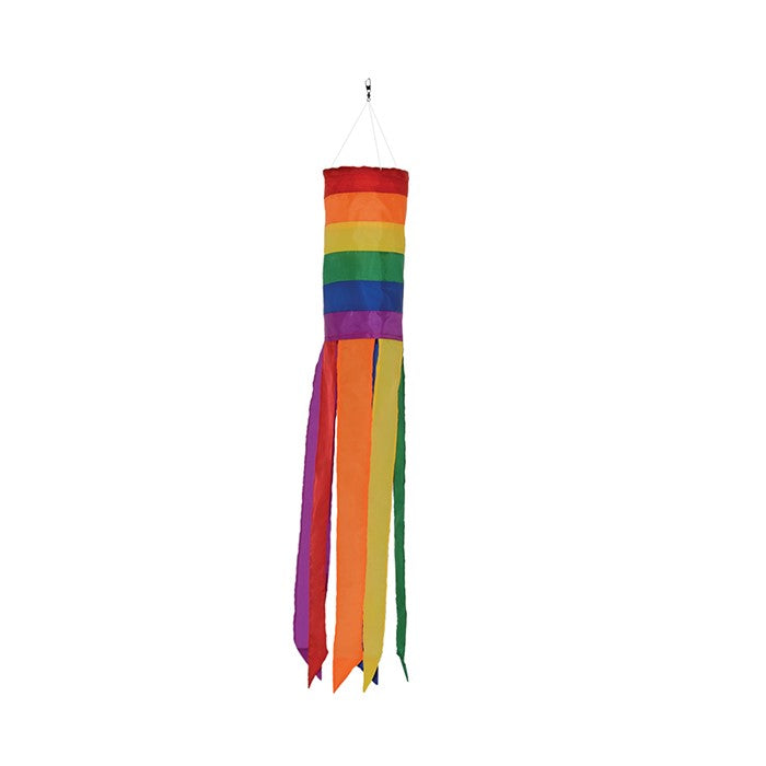 Rainbow Column 24" Windsock featuring vibrant colors and six coordinated tails, displayed outdoors in a garden setting.