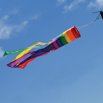 Rainbow Column 33" Windsock featuring vibrant colors and long tails dancing in the breeze, ideal for adding a joyful touch to any outdoor setting.