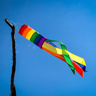 Rainbow Column 33" Windsock featuring vibrant colors and long tails dancing in the breeze, ideal for adding a joyful touch to any outdoor setting.