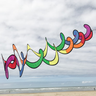 Vibrant Rainbow Curlie Duet hanging twister made from weather-resistant fabric, featuring a double helix design that spins gracefully with the wind.