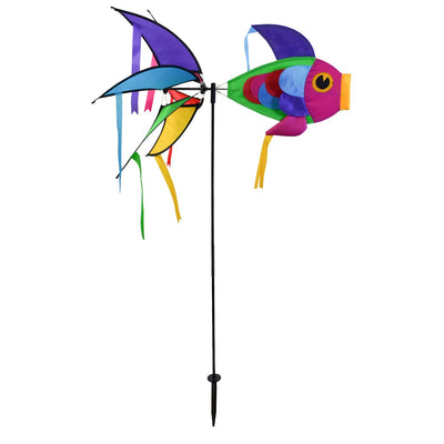 Rainbow Damselfish Spinner featuring vivid rainbow colors in a garden, spinning gracefully atop a fiberglass pole.
