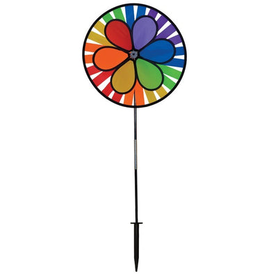 Rainbow Dazy Wheel garden spinner featuring a colorful design with a 12-inch petal top and a 15-inch spinner wheel, displayed outdoors.