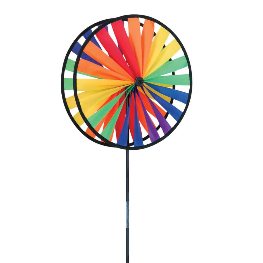 Rainbow Double Wheel Spinner showcases colorful double wheels spinning in the wind, bringing life to a garden setting.