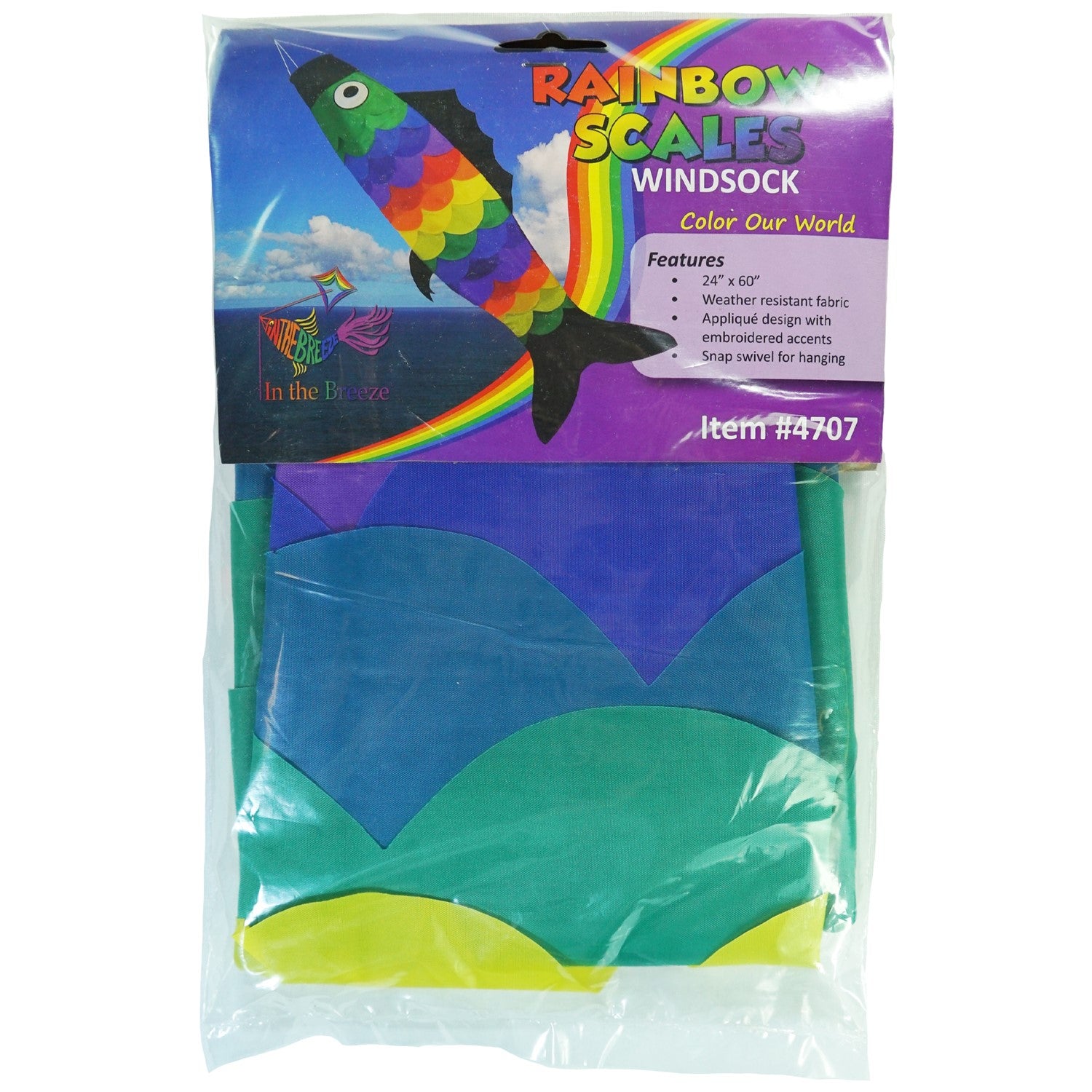 Rainbow Scales Fishsock, a colorful and whimsical windsock with detailed applique, displayed in an outdoor garden setting, showcasing its design.