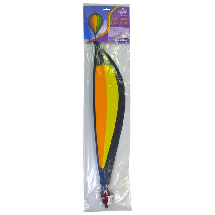 Rainbow Spectrum 10-Panel Hot Air Balloon spinner featuring colorful panels gently spinning in a garden setting, capturing the joy of outdoor decor.