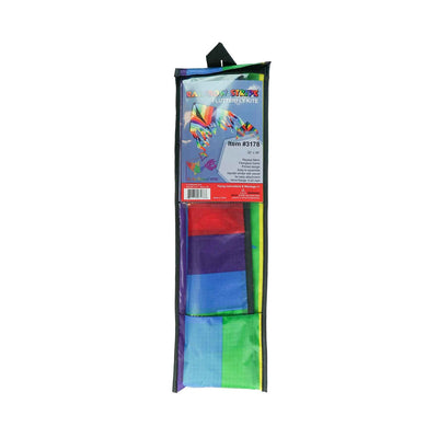 Rainbow Stripe 32' Flutterfly Delta Kite soaring high in the sky, showcasing vibrant colors and fluttering tails against a blue backdrop.