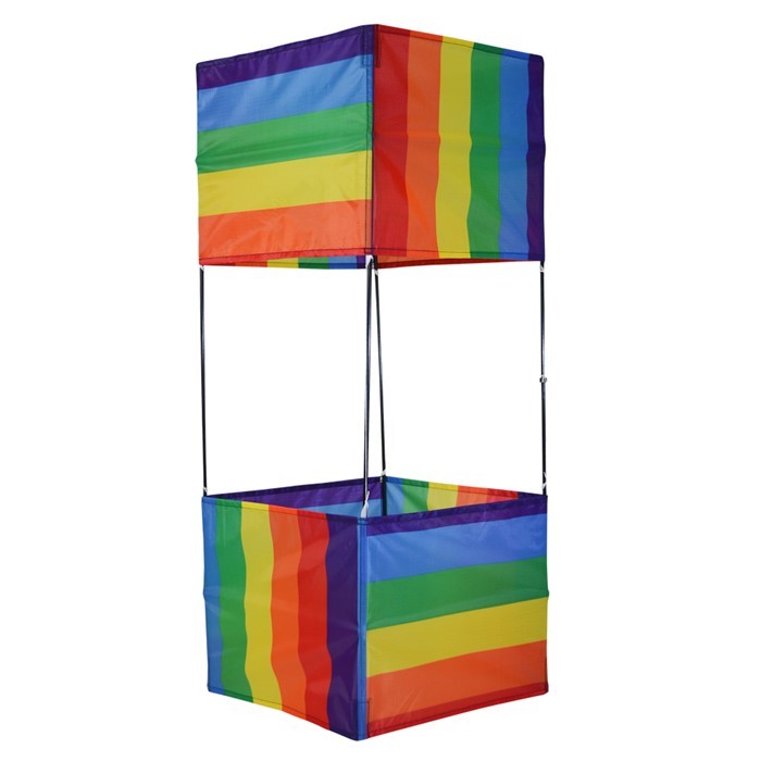 Rainbow Stripe Box Kite in mid-flight with colorful stripes against a clear blue sky, showcasing its vibrant 3D design.