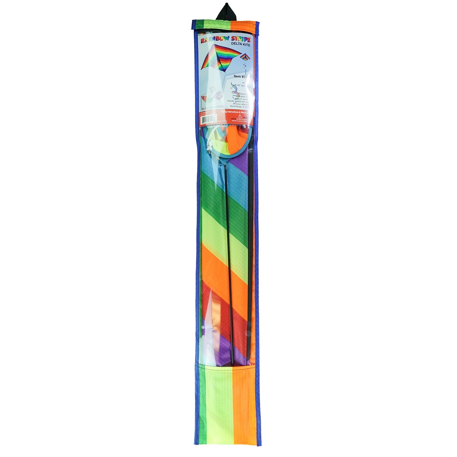 Rainbow Stripe Delta kite with a curlie spinning tail flying against a clear blue sky and green grass backdrop, showcasing its vibrant colors.