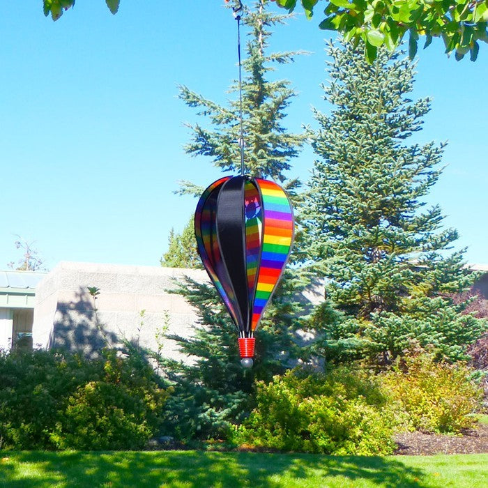 Rainbow Stripe Next Generation 8-Panel Hot Air Balloon that spins in the wind, featuring vibrant rainbow stripes and a durable design for long-lasting outdoor use.