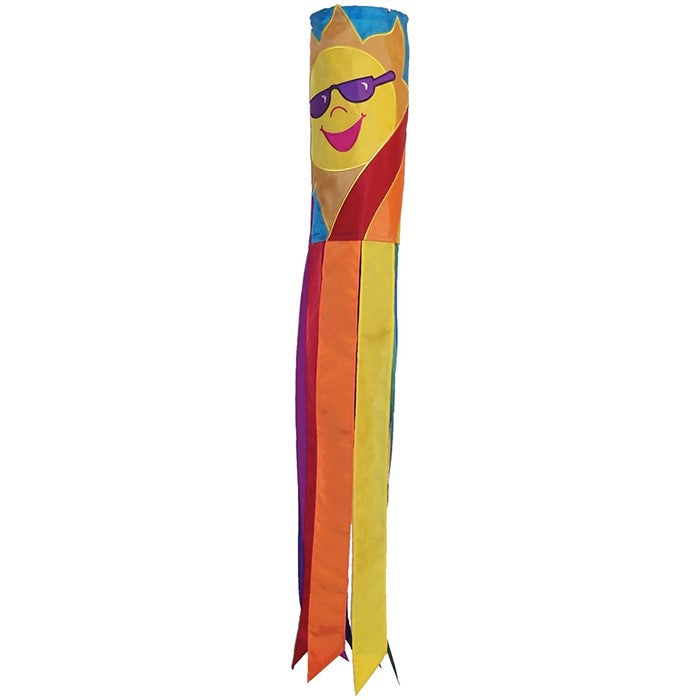 Rainbow Sun 40 inches windsock displaying bright, colorful sun design with eight fluttering tails, hanging in a garden setting.
