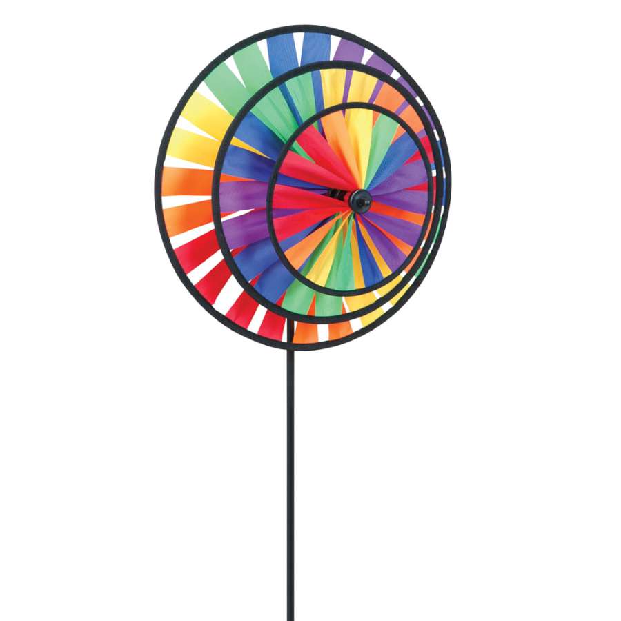 Rainbow Triple Wheel Spinner displaying vibrant colors; it spins gracefully in the breeze, adding charm to a garden setting.