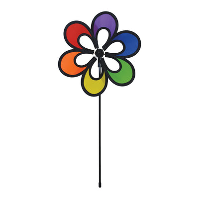 10-inch Rainbow Windee Wheelz Spinner with open-center petal design, spinning in the breeze among flowers in a garden setting.