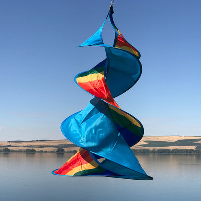 Rainbow Wow Spin Duet double spinner garden decor with vibrant colors in a gentle breeze, featuring intricate designs and durable materials.